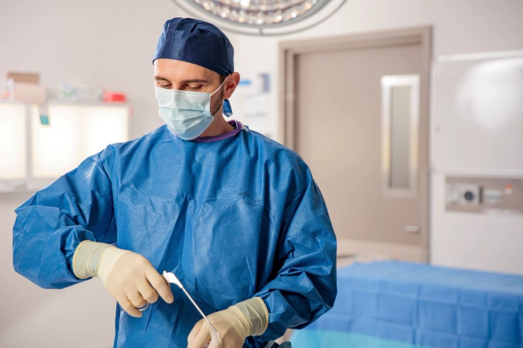 Dr Alexey Borshch in the operating scrubbed for surgery