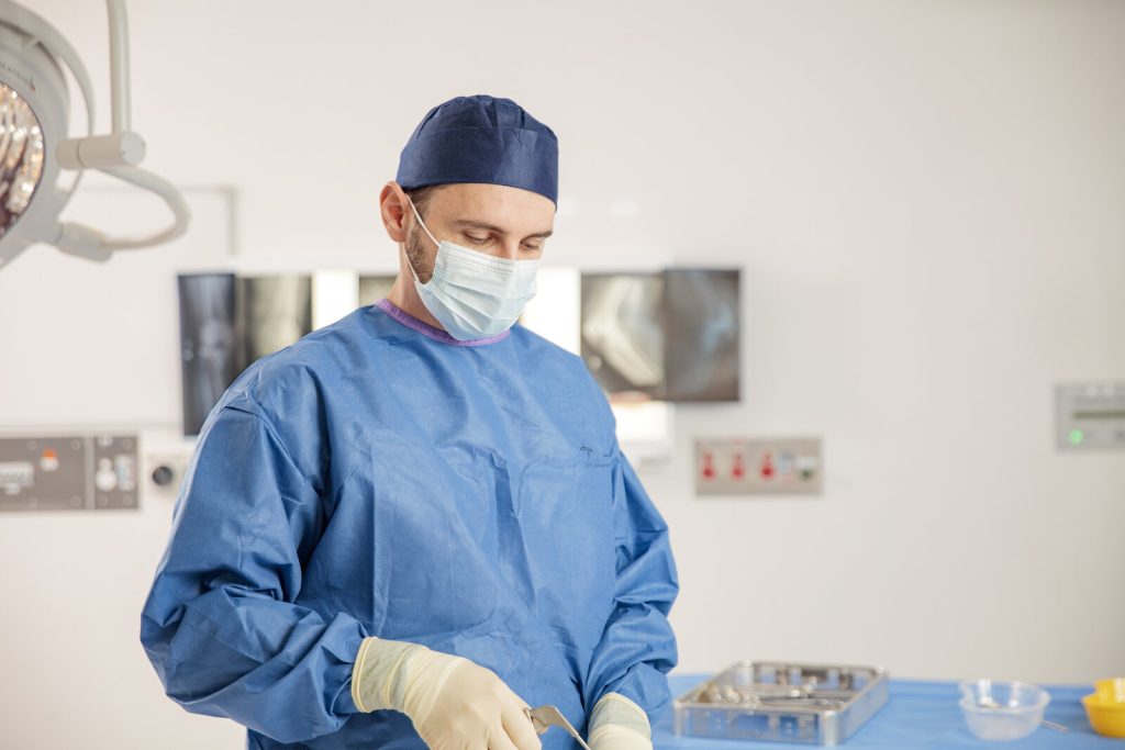 Dr Alexey Borshch gowned in the operating theatre
